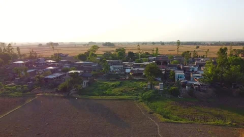 Tribal village in the middle of the fields Stock Footage 246924126