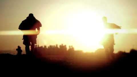 Tribe members running, slow motion Video stock 137490022