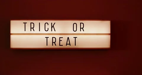 Trick or Treat text displayed on a LED lightbox  Stock Footage 140823387