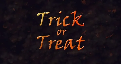 Trick or Treat text dissolving into dust to bottom Stock Footage 71124634