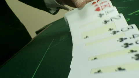 Trick play cards on the green table Stock Footage 219643751