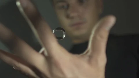 The trick with the ring. Levitation ring in the hand of the magician. Slow Video stock 89581828