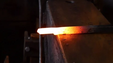 A Tricky Bit of Forging Being Done by a Blacksmith to Create a Boss in Vidéo 101500015