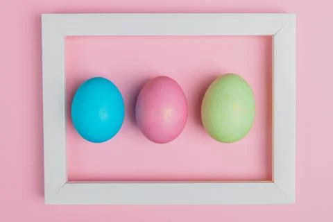 Tricolor easter egg in a white frame Stock Photos