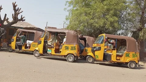 Tricycles Parked and Loading Passengers Kano Nigeria 動画素材 325951371