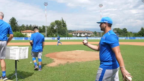 Trieste, Italy - 2023/08/03: baseball players put the ball in the basket 動画素材 259900853
