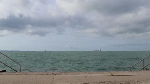 TRIESTE, ITALY - OCTOBER 26, 2020: The time lapse of people walking on the Tr Stock Footage
