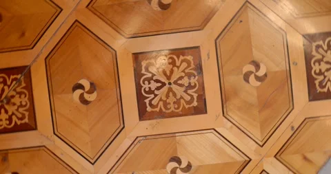 Trieste, Italy — reverse rotation across an ornate parquet floor with geometric Stock Footage 315640537