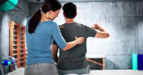 Trigger Point Back Massage Therapist Doing Stock Photos