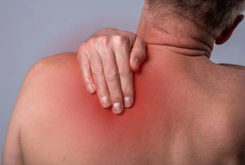 Trigger points pain. Ache in back, pressure in scapula close up Stock Photos