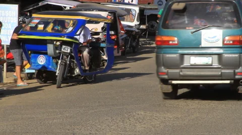 Trikes drive through the Philippines Stock Footage 49882791