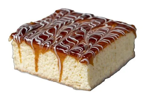 Trilece cake slice isolated on white background. Milk and caramel cake. Baker Stock Photos