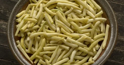Trimmed and sliced yellow string beans in a bowl. Stock Footage 281177877