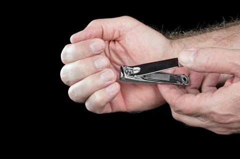 Trimming fingernails Stock Photos