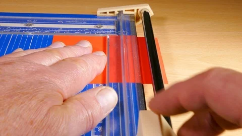 Trimming pieces of thick paper / thin card. Stock-Footage 113677071