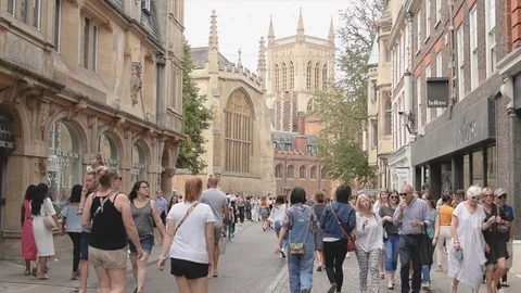 Trinity and St Johns street with pedestrians and view to Trinity College Stock Footage 92847177