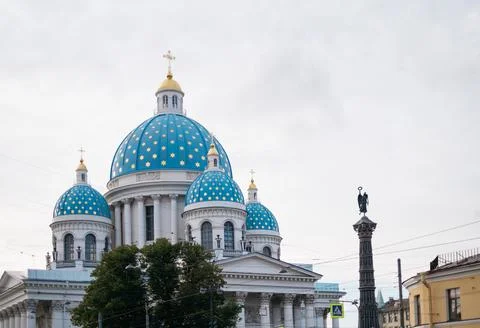 Trinity Cathedral with blue domes and the Column of Glory. The monument was Stock Photos