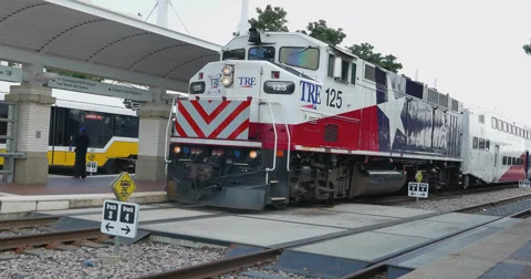 Trinity Railroad Express leaving Union station in Downtown Dallas Video stock 64079782