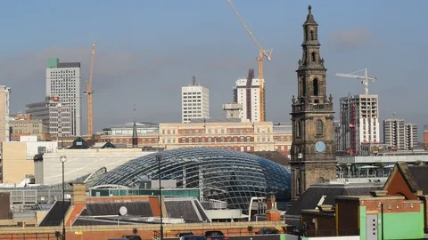 Trinity shopping complex and trinity church leeds uk Stock Footage 98399037