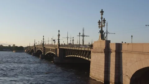 Trinity (Troitsky) bridge and the Neva river in the sunset in the summer Stock Footage 81894100