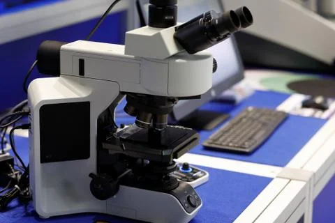 Trinocular optical microscope in a laboratory Stock Photos