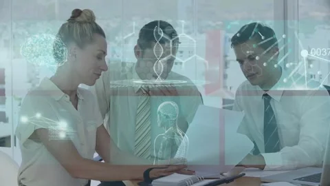 Trio consulting reports, right man pointing pen sparking medical brain or DNA Stock Footage 332289971