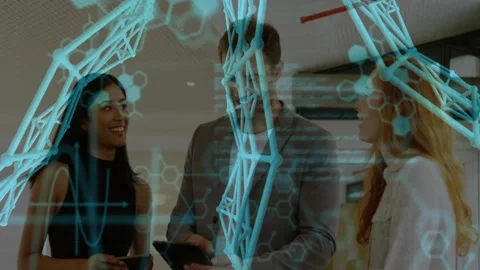 Trio in office, man tapping tablet and causing AR molecular lattice overlaying Stock Footage 333900277