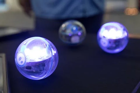A trio of programmable off-the-shelf Sphero robots are shown at the Center .. 스톡 사진