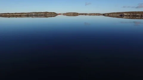 A trip along the water surface along the stones that frame the water Stock Footage 75465248