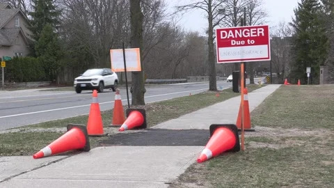 Trip and fall hazard on city street and sidewalk Vidéo 151728527
