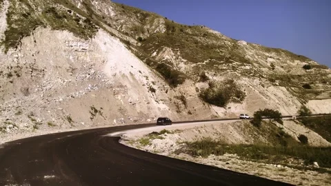 A trip by car in a mountainous area, a trip along the serpentines by car Stock Footage 260003764
