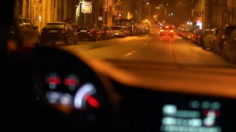 Trip inside the car at night in the rain. View through the windshield in Stock Footage 93438827