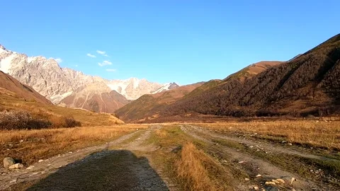 Trip to Mount Shkhara during sunset, Georgia Stock Footage 163237012