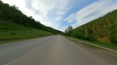 A trip to a mountainous area in a remote area. Nature, forest lands. A car at Stock Footage 158102110