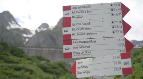 Trip pointer indicator showing the direction of travel routes in the Alps Stock Footage 51916606