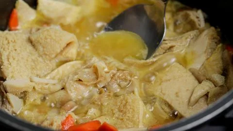 Tripe, close-up, being cooked in a pan Stock Photos