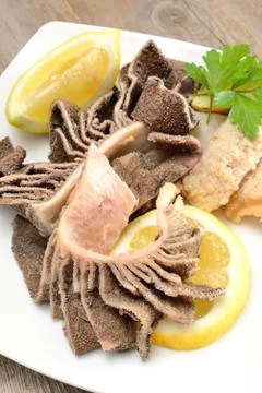 Tripe with lemon Stock Photos