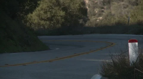 Triple autos uphill Stock Footage 1066213