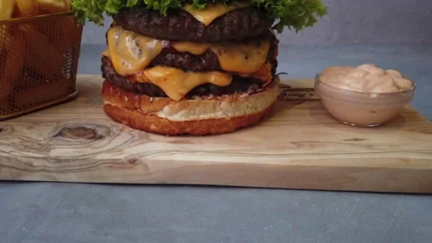 Triple Cheeseburger Stock Footage 99953189