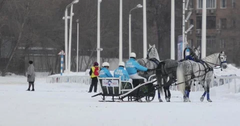 Triple during snowfall at 18 Russian championship of Russian triples on Moscow Stock Footage 276364600