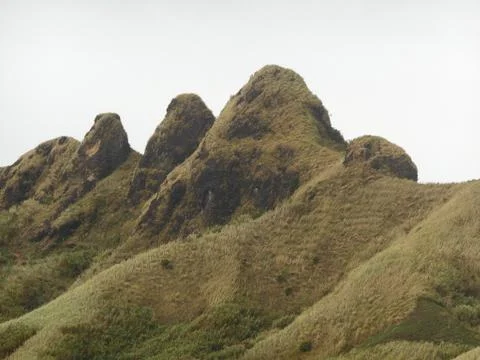 Triple summit with white background. Stock Photos