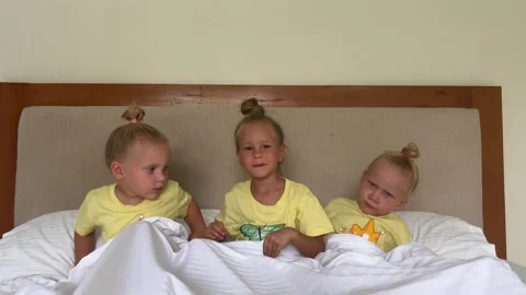 Triplets little girls, three sisters Stock Video Pond5