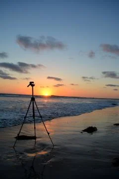Tripod on the beach at sunset Stock-Fotos