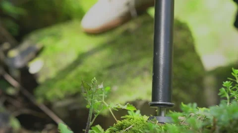 Tripod on a green mountain wall Video stock 145327684