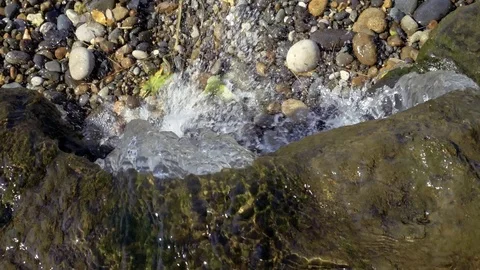 Tripod: River flowing over rocks in stream along river Stock-Footage 115084351