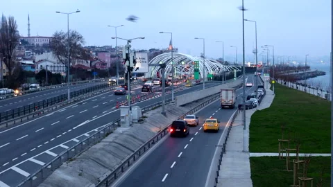 Tripod shot from the road bridge in Istanbul pointing to the road with vehicl Stock Footage 189820341