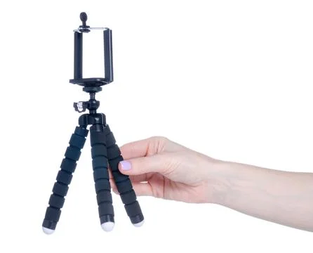 Tripod for smartphone in hand Stock Photos