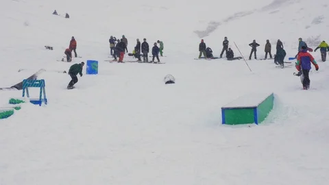 Tripod Snowboarder Clears Obstacle Stock Footage 99261724