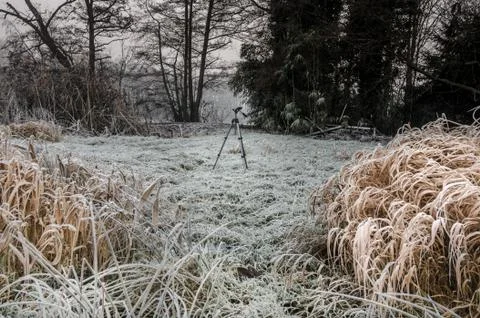Tripod standing in the field Stock Photos
