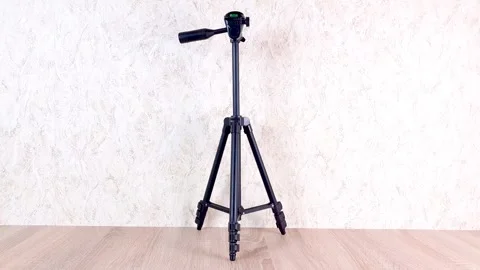 Tripod for video camera, camera. Tripod for photographers. Stock Footage 280581757